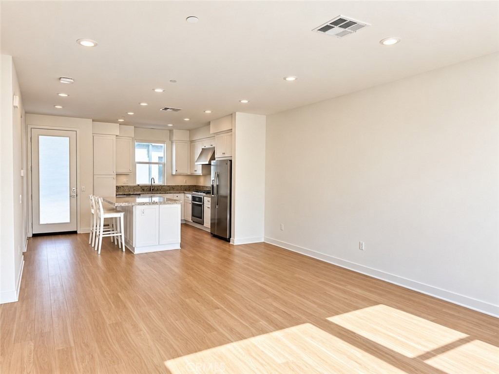 Second Floor Great Room which opens to Kitchen - 383 Bellver, Lake Forest CA 92630 - photo 8
