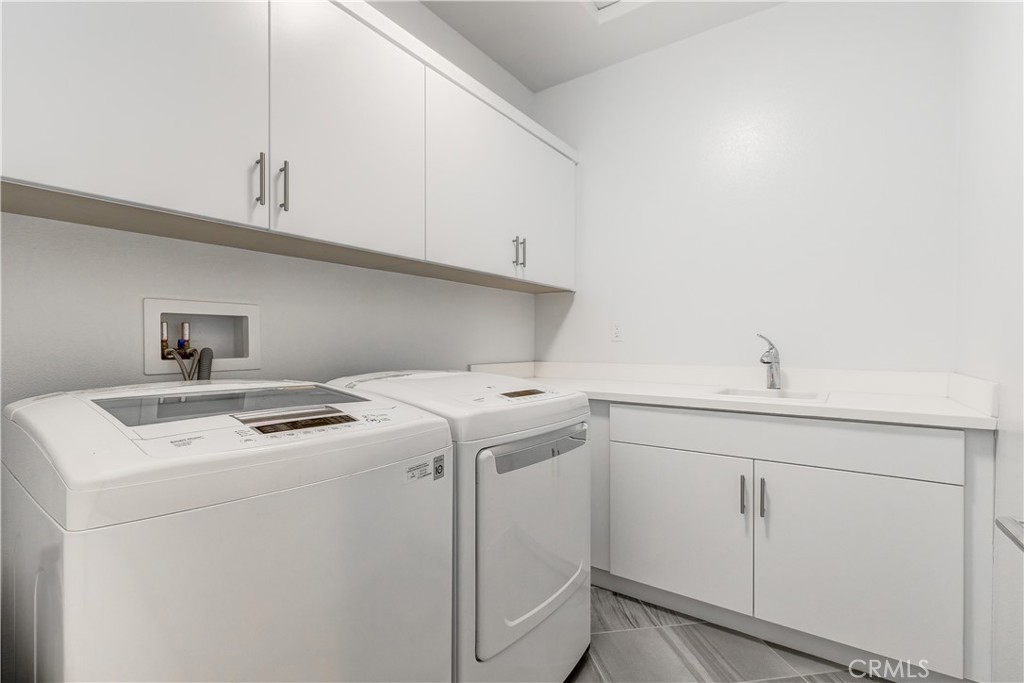 Laundry room upstairs - 47 Prominence, Lake Forest CA 92630 - photo 18