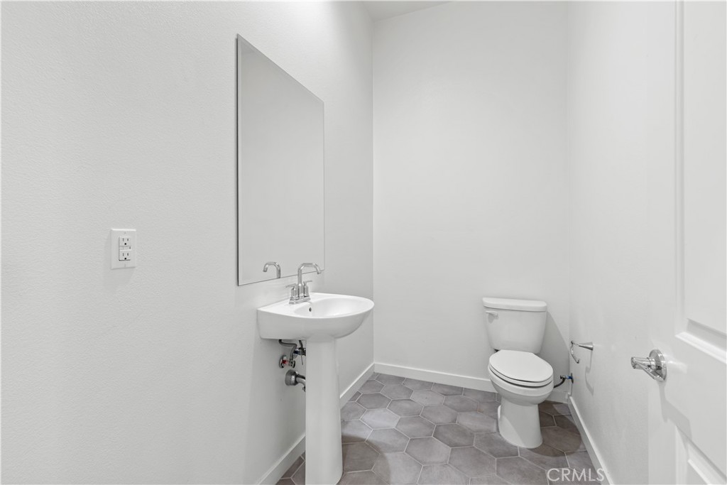 1st level 1/2 bath - 604 White Oaks, Lake Forest CA 92610 - photo 7