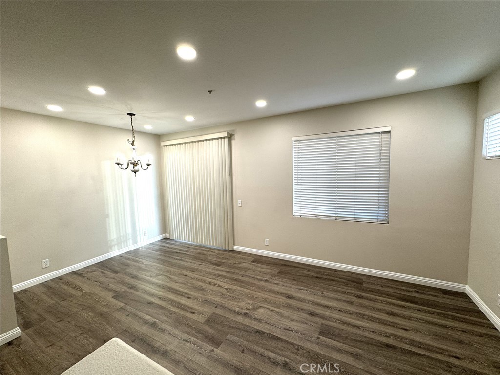 Living and dining areas - 88 Mission Court, Lake Forest CA 92610 - photo 1