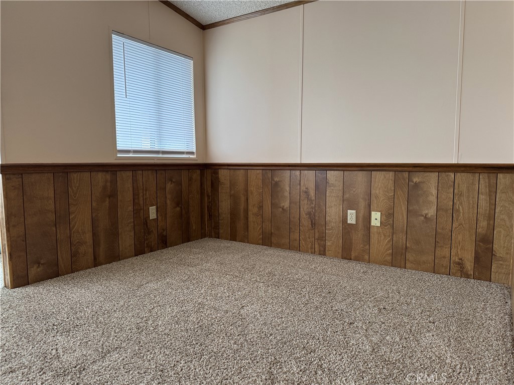 Living Room/Sitting Area adjacent the Den - 10681 Oak Street 58, Los Alamitos CA 90720 - photo 5