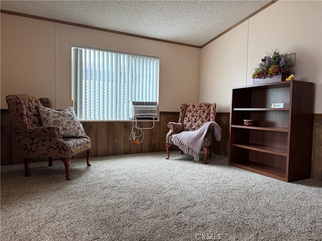 Den adjacent the Living Room - 10681 Oak Street 58, Los Alamitos CA 90720 - photo 6