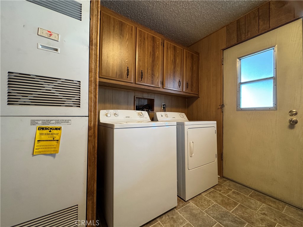 Laundry Room with Washer and Dryer Included - 10681 Oak Street 58, Los Alamitos CA 90720 - photo 11
