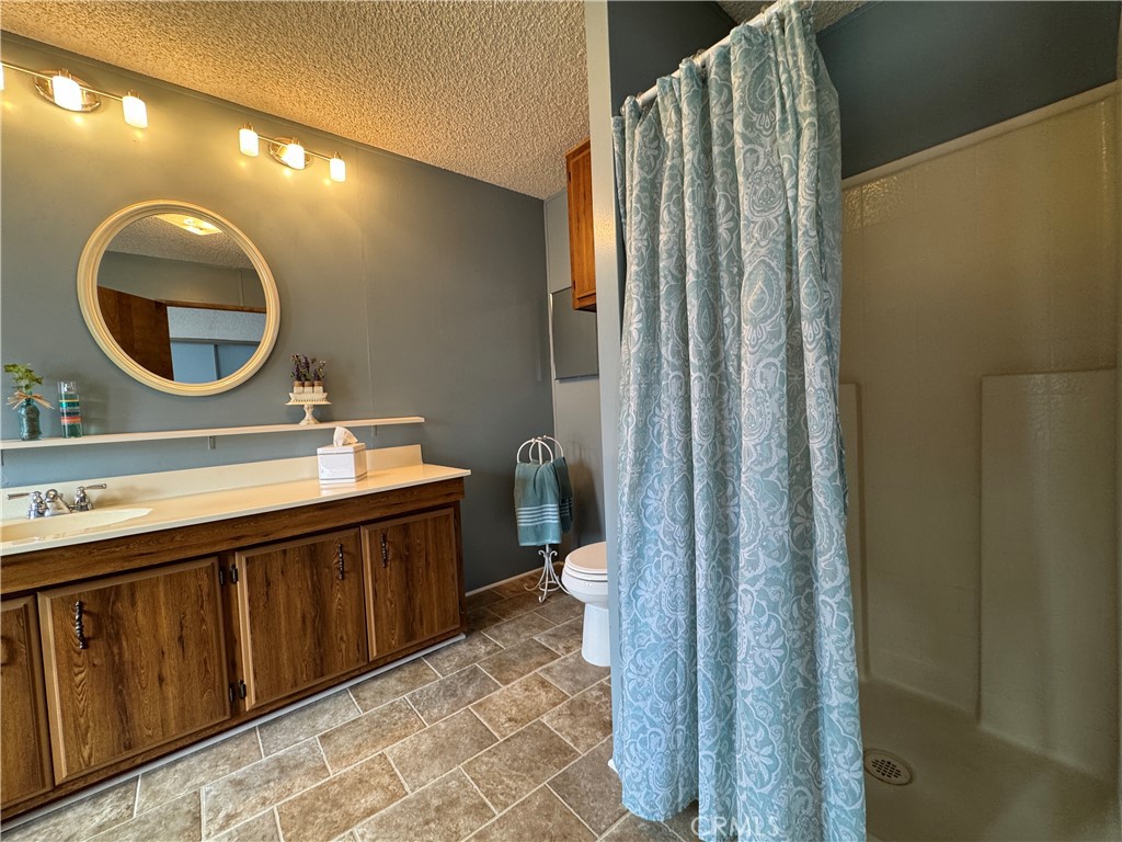Master Bathroom with Shower - 10681 Oak Street 58, Los Alamitos CA 90720 - photo 18
