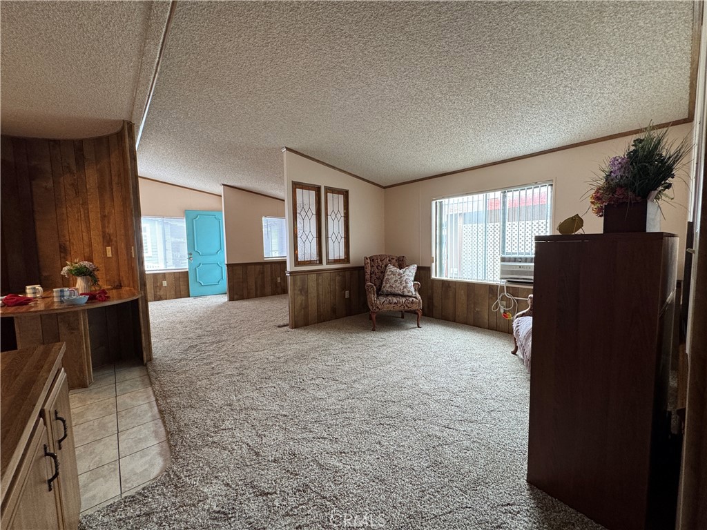 View of the Den, Living Space from the Hallway - 10681 Oak Street 58, Los Alamitos CA 90720 - photo 20