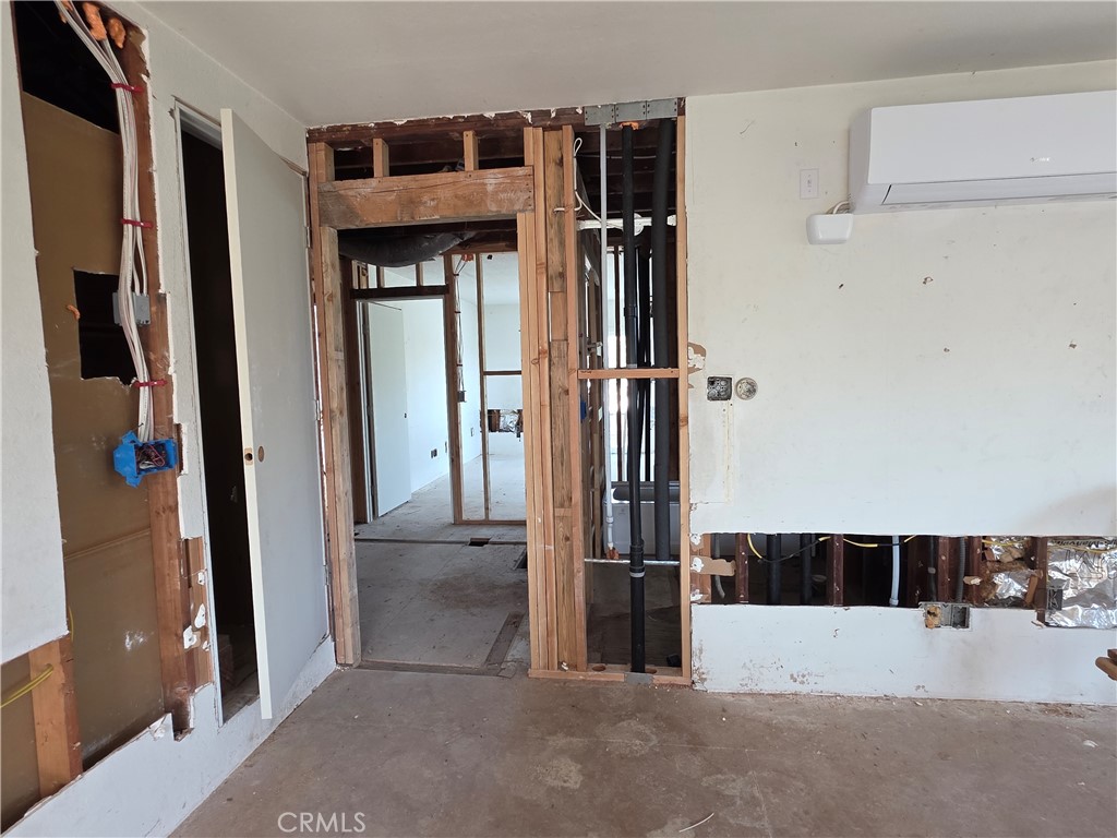 View from greatroom looking towards bathroom and 2 rooms - 11101 Essex Drive, Los Alamitos CA 90720 - photo 5