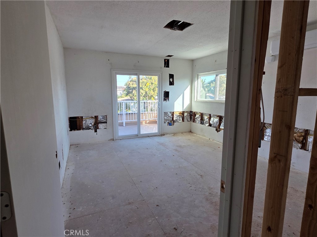 View of 1 room with slider - 11101 Essex Drive, Los Alamitos CA 90720 - photo 8