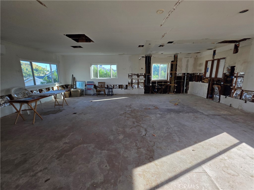 View of large room with kitchen - 11101 Essex Drive, Los Alamitos CA 90720 - photo 9