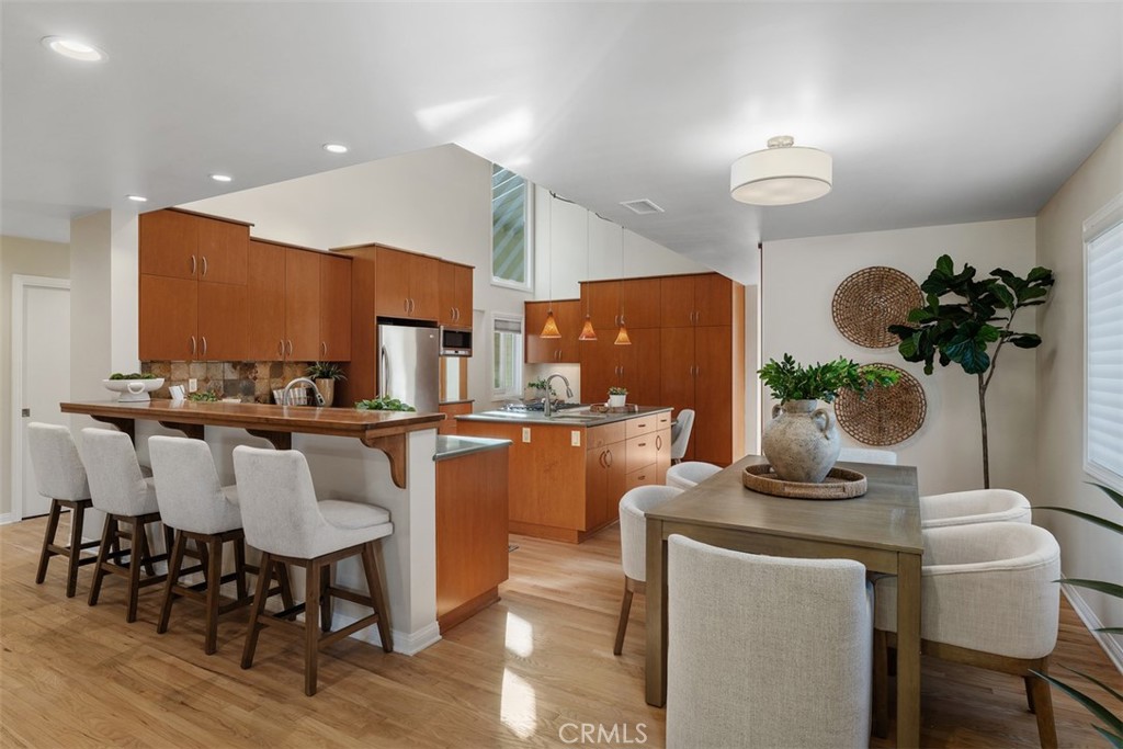 Dining room adjacent & open to kitchen. - 11772 Paseo Bonita, Los Alamitos CA 90720 - photo 10
