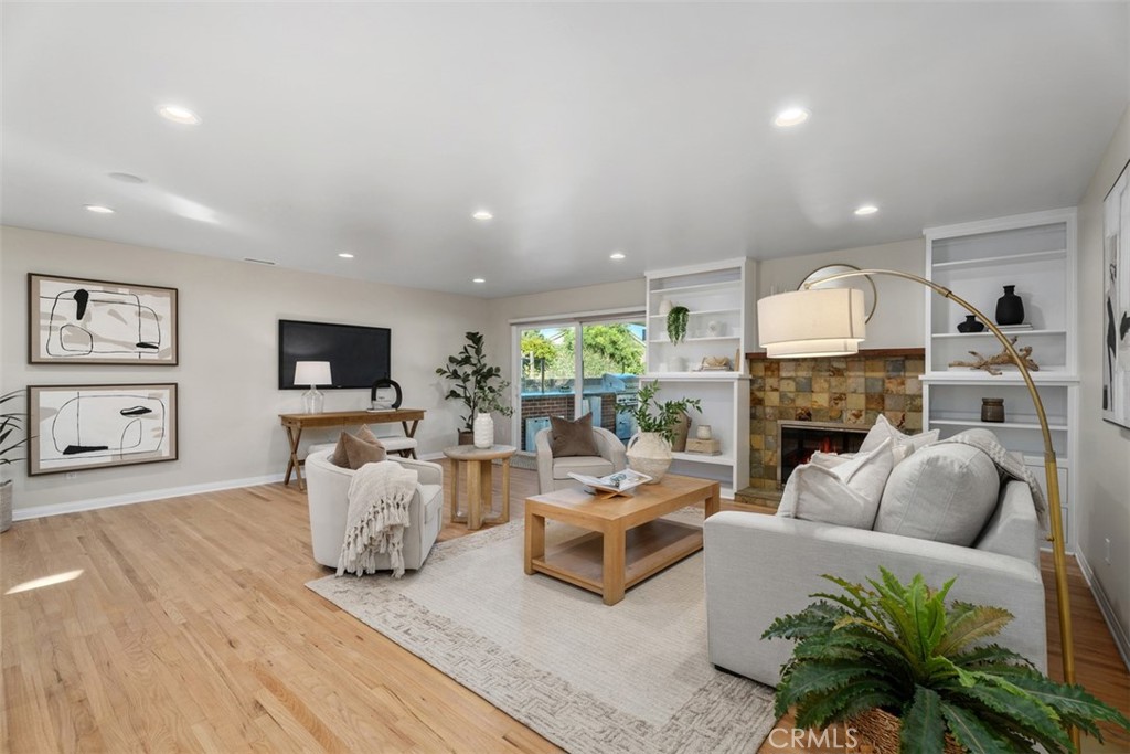 Living Area with fireplace, LED recessed dimmable lighting - 11772 Paseo Bonita, Los Alamitos CA 90720 - photo 13