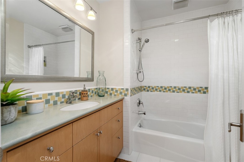 Bathroom 2: Remodeled Full bath w/tub, shower, sink & storage. - 11772 Paseo Bonita, Los Alamitos CA 90720 - photo 18