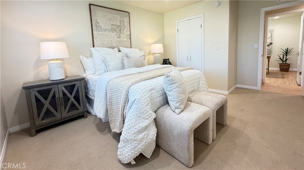Primary bedroom: new carpet, dual pane window, recessed LED lights, walk in closet. - 11772 Paseo Bonita, Los Alamitos CA 90720 - photo 20