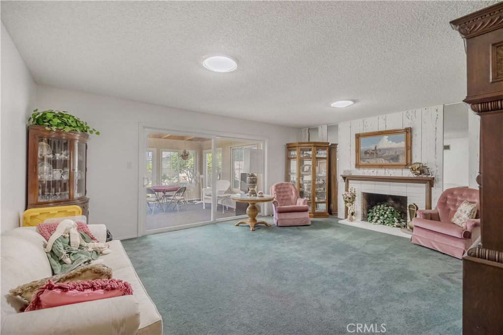Living room/family room with fireplace - 11971 Pine, Los Alamitos CA 90720 - photo 8