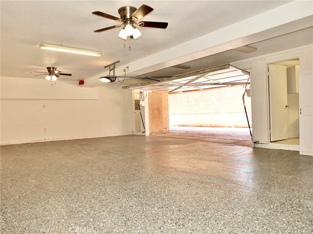 Another view of the spacious garage, with room for a children’s play or study area or a craft space. - 4441 Farquhar, Los Alamitos CA 90720 - photo 27