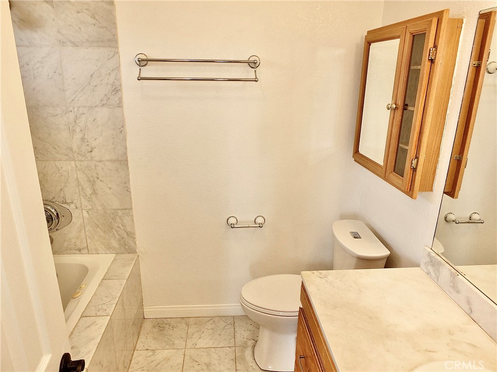 View looking into primary bathroom. - 4441 Farquhar, Los Alamitos CA 90720 - photo 33