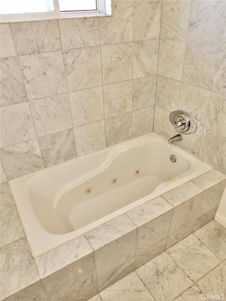 Primary tiled jet tub/shower combo. - 4441 Farquhar, Los Alamitos CA 90720 - photo 35