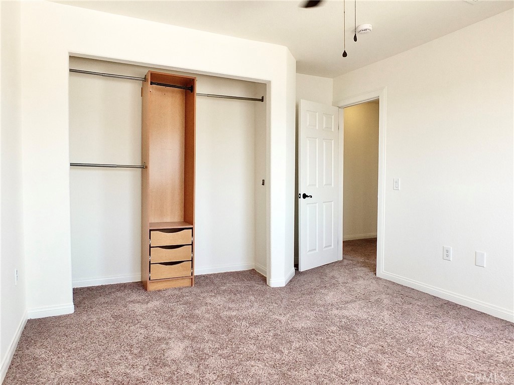 View of closet in back bedroom. - 4441 Farquhar, Los Alamitos CA 90720 - photo 41