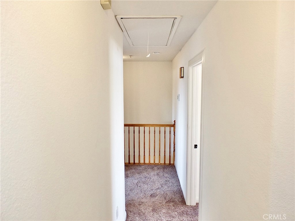View in hallway of easy accessible new attic pull down ladder. - 4441 Farquhar, Los Alamitos CA 90720 - photo 51