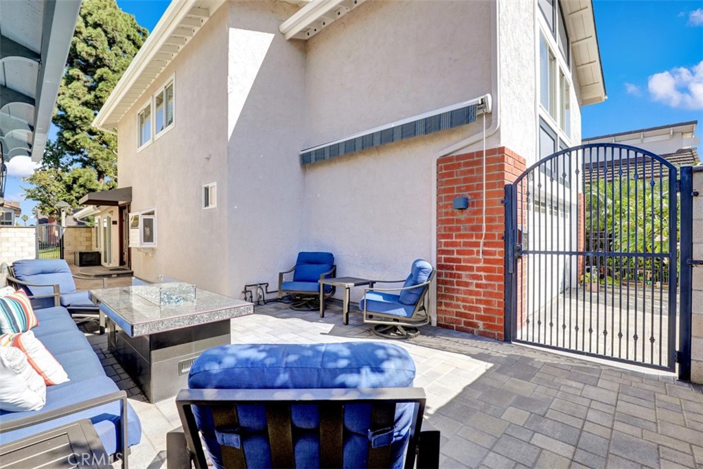 Price Includes lovely outdoor furniture and fire table that have canvas covers - 5021 Apollo Circle, Los Alamitos CA 90720 - photo 3