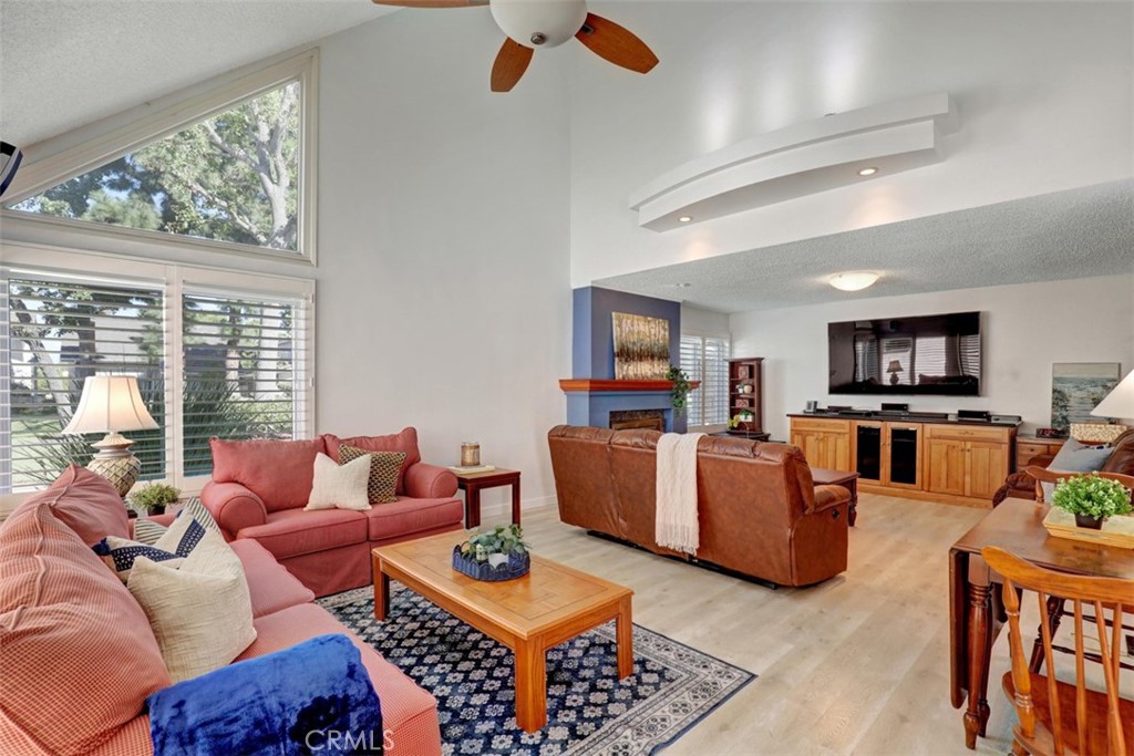 Bright & sunny floorplan! Living room with vaulted ceilings - 5021 Apollo Circle, Los Alamitos CA 90720 - photo 5