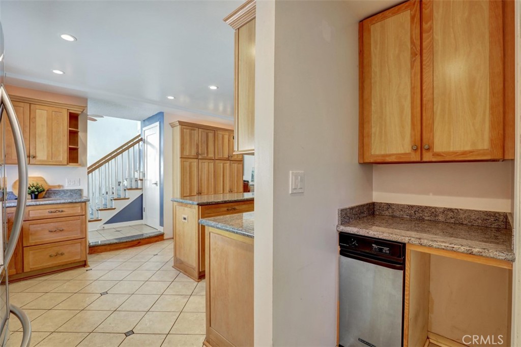 Pantry just in from the​​‌​​​​‌​​‌‌​​‌‌​​‌‌​​‌​​​‌‌​‌​​​​‌‌​‌​​ garage. - 5021 Apollo Circle, Los Alamitos CA 90720 - photo 29