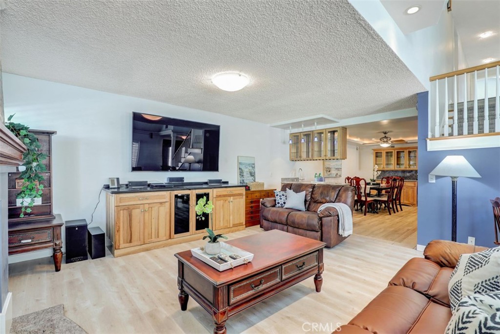 Living room toward Wet Bar - 5021 Apollo Circle, Los Alamitos CA 90720 - photo 32