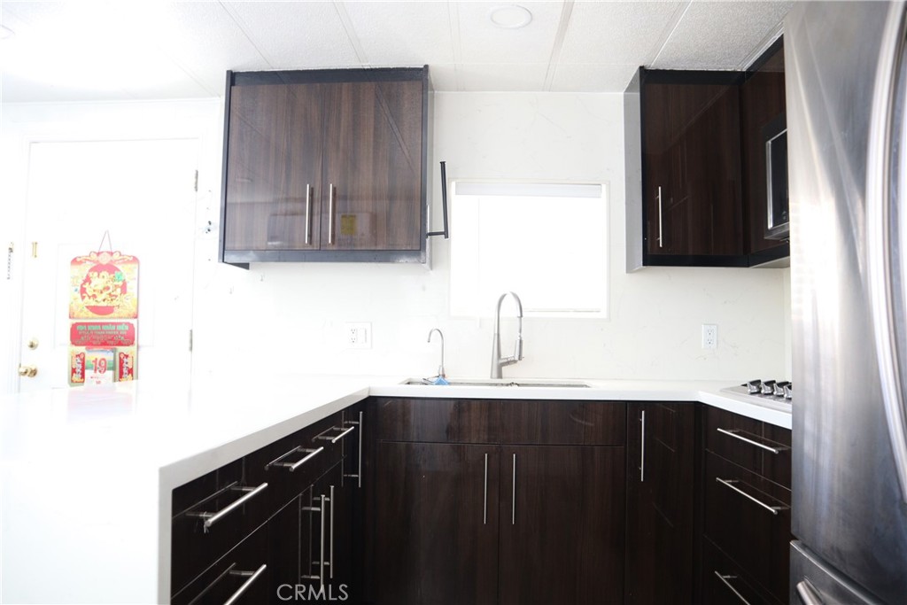 kitchen2 - 15141 beach Boulevard 63, Midway City CA 92655 - photo 5