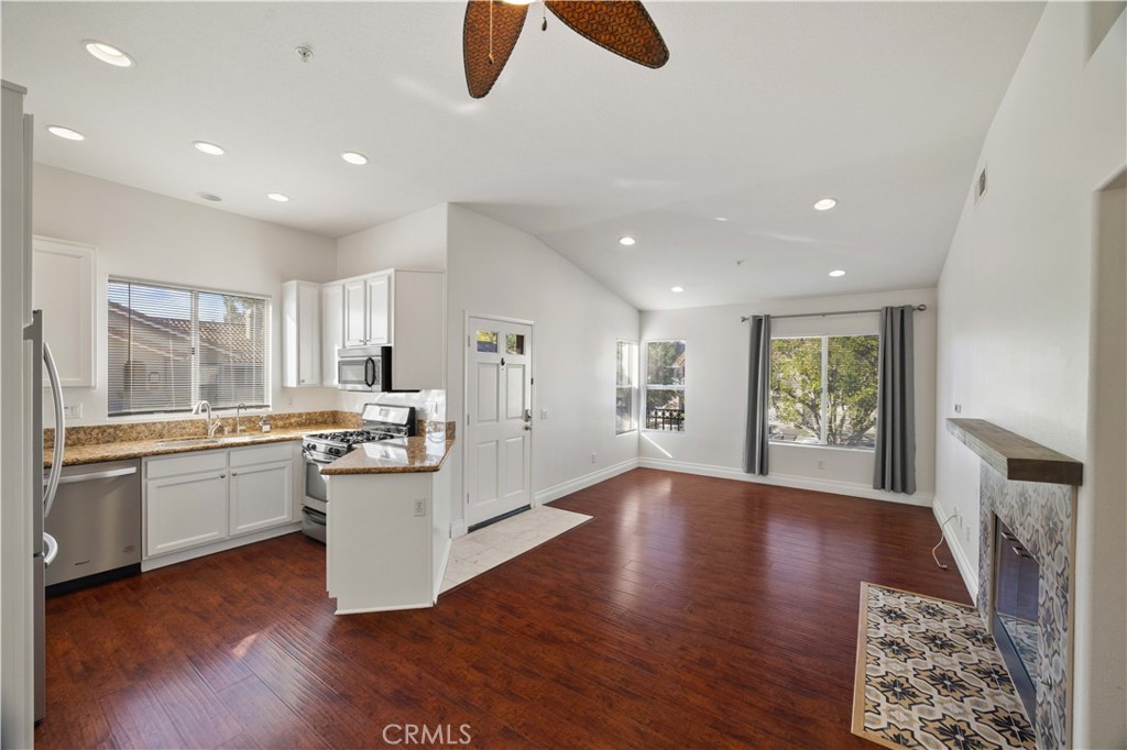 Kitchen is next to dining and living room. - 202 California Ct, Mission Viejo CA 92692 - photo 1