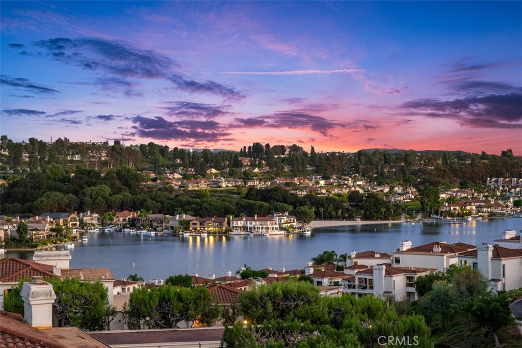 They say nothing in life is guaranteed—but this spectacular view is yours to enjoy every single day of the year. - 22396 Estallens 56, Mission Viejo CA 92692 - photo 1