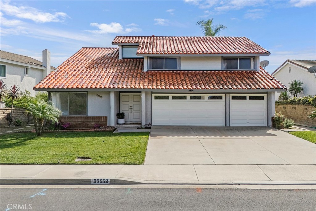Perfectly situated on a single-loaded street within a quiet cul-de-sac, this home offers a prime location with an added - 22552 Sacedon, Mission Viejo CA 92691 - photo 1