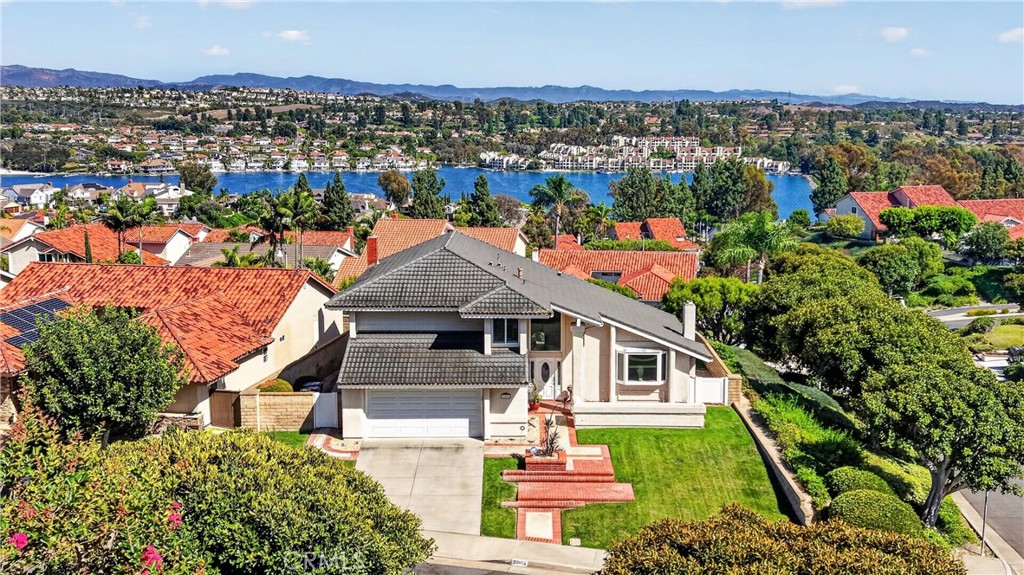 Located on a quiet street with views of Lake Mission Viejo. - 22852 Buendia, Mission Viejo CA 92691 - photo 2