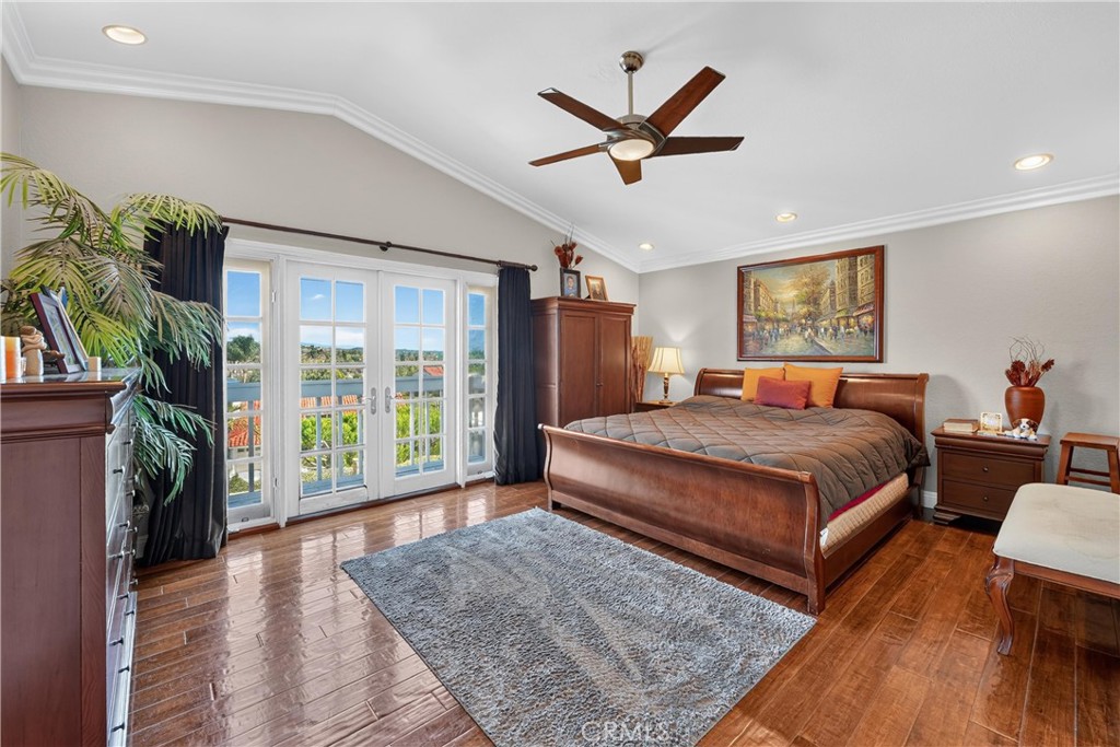 Located upstairs the Primary bedroom suite has panoramic valley views. - 22852 Buendia, Mission Viejo CA 92691 - photo 39