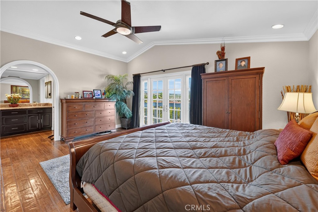 Another view of the primary suite with vaulted ceilings and crown moulding. - 22852 Buendia, Mission Viejo CA 92691 - photo 40