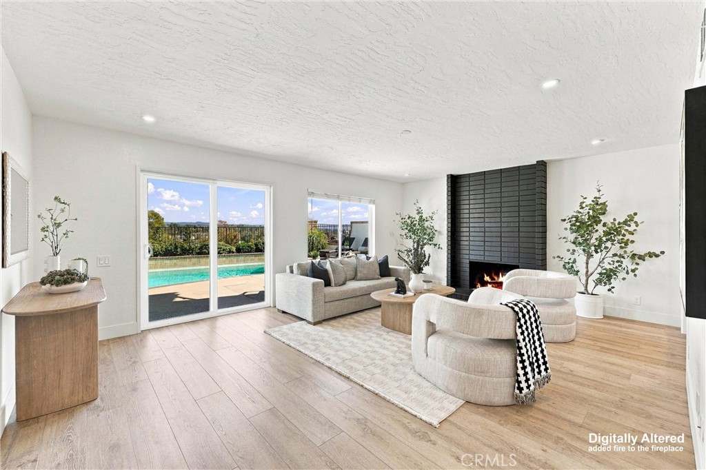 digitally altered - fire in fireplace - 22942 Arija, Mission Viejo CA 92691 - photo 9