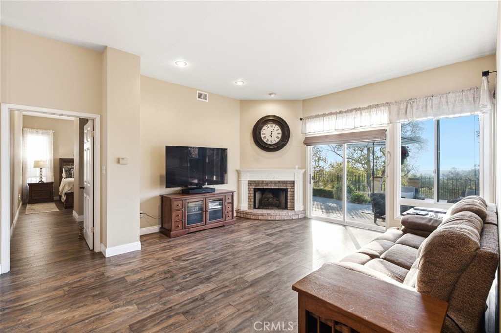 Second fireplace in family room - 23001 Via Santa Maria, Mission Viejo CA 92691 - photo 5