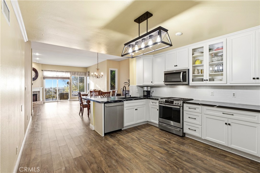 Upgraded kitchen with newer appliances - 23001 Via Santa Maria, Mission Viejo CA 92691 - photo 7