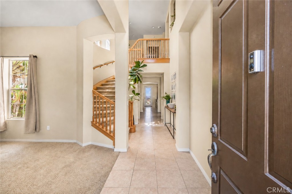 2 story foyer welcomes you home with a formal living room for easy entertaining. - 23041 Poplar, Mission Viejo CA 92692 - photo 5