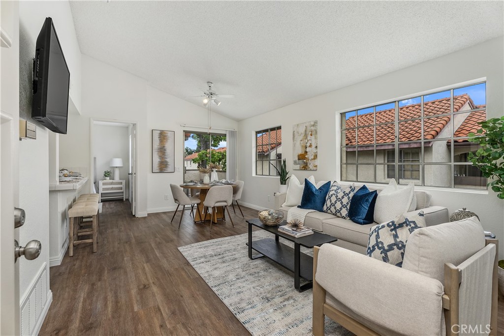 Open floor plan features vaulted ceilings and LVP flooring - 23371 #E 290 La Crescenta, Mission Viejo CA 92691 - photo 1