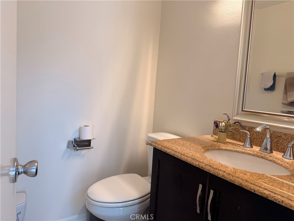 Powder room downstairs. 2 addl. bathrooms upstairs. - 23431 Via Linda D-or-#65, Mission Viejo CA 92691 - photo 7