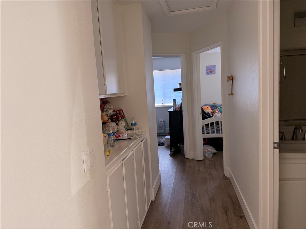 Nice wood laminate floors upstairs. - 23431 Via Linda D-or-#65, Mission Viejo CA 92691 - photo 9