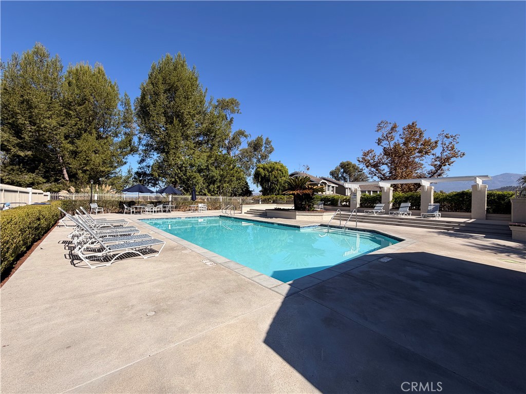 Community pool and spa. - 23431 Via Linda D-or-#65, Mission Viejo CA 92691 - photo 16