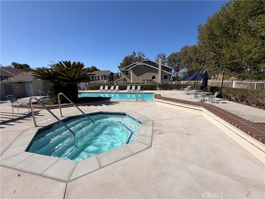 Community pool and spa. - 23431 Via Linda D-or-#65, Mission Viejo CA 92691 - photo 18