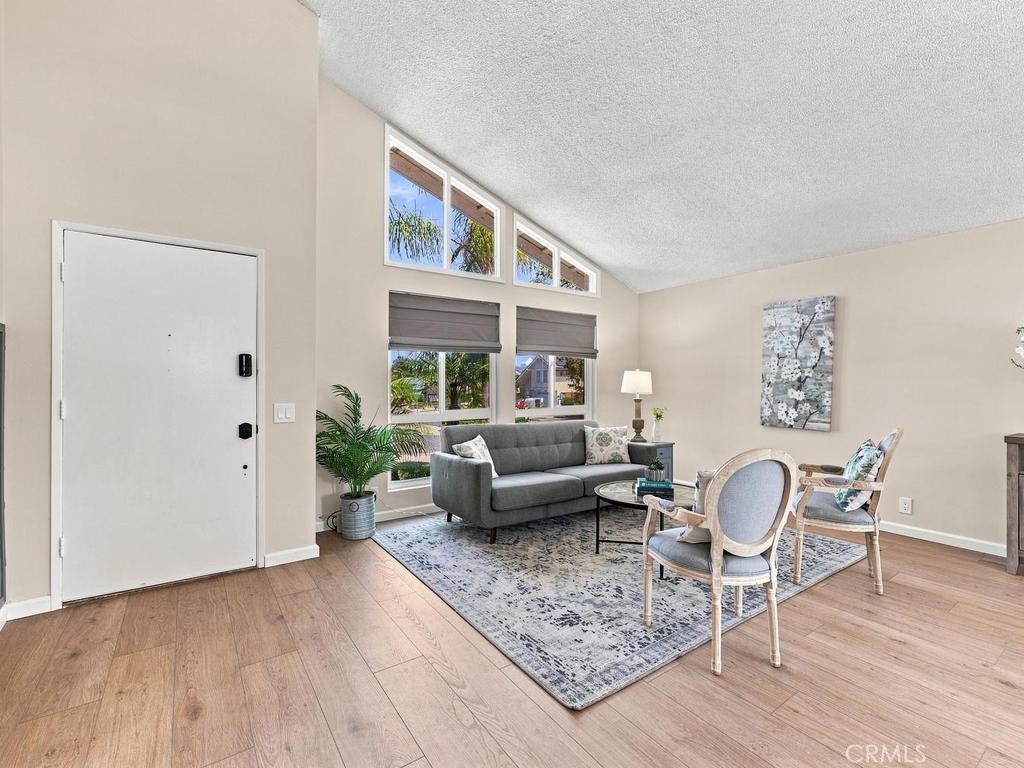 Formal living room with vaulted ceilings - 23862 Copenhagen, Mission Viejo CA 92691 - photo 3