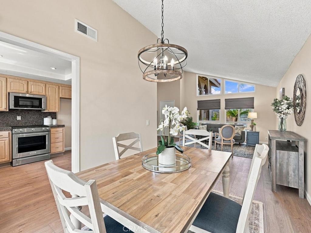 Dining room with pass through to kitchen - 23862 Copenhagen, Mission Viejo CA 92691 - photo 6