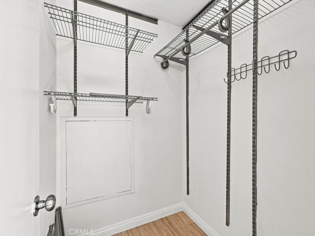 Walk-in closet in Bedroom 4 - 23862 Copenhagen, Mission Viejo CA 92691 - photo 32