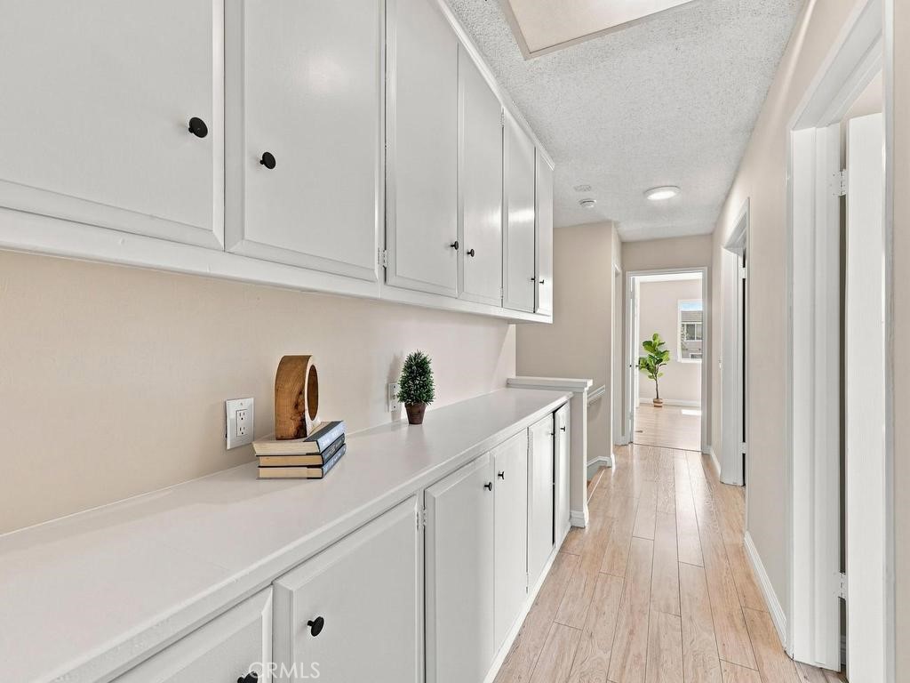 Built-in cabinetry in upper hallway - 23862 Copenhagen, Mission Viejo CA 92691 - photo 33