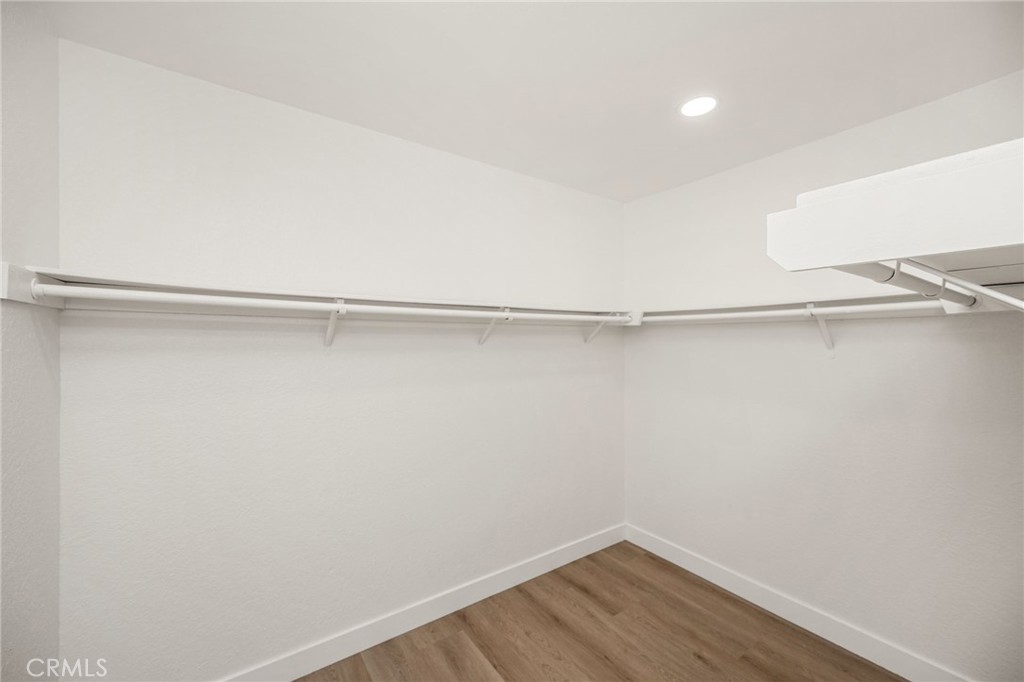 Primary walk in closet - 24112 Zancon, Mission Viejo CA 92692 - photo 28