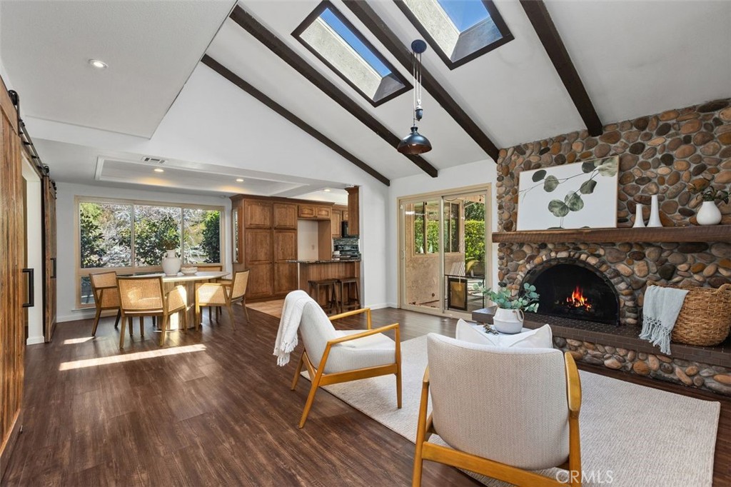 Vaulted ceilings with skylights provide plenty of natural light. - 24832 El Cortijo, Mission Viejo CA 92691 - photo 3
