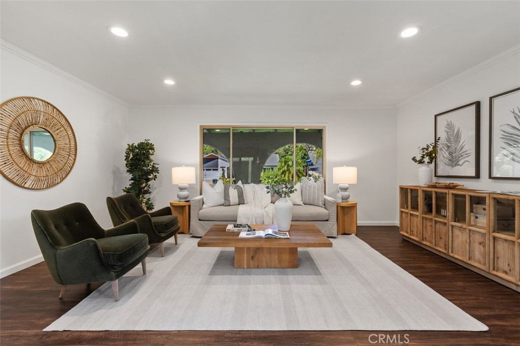 The den just next to the living room with views out to the front yard. - 24832 El Cortijo, Mission Viejo CA 92691 - photo 12