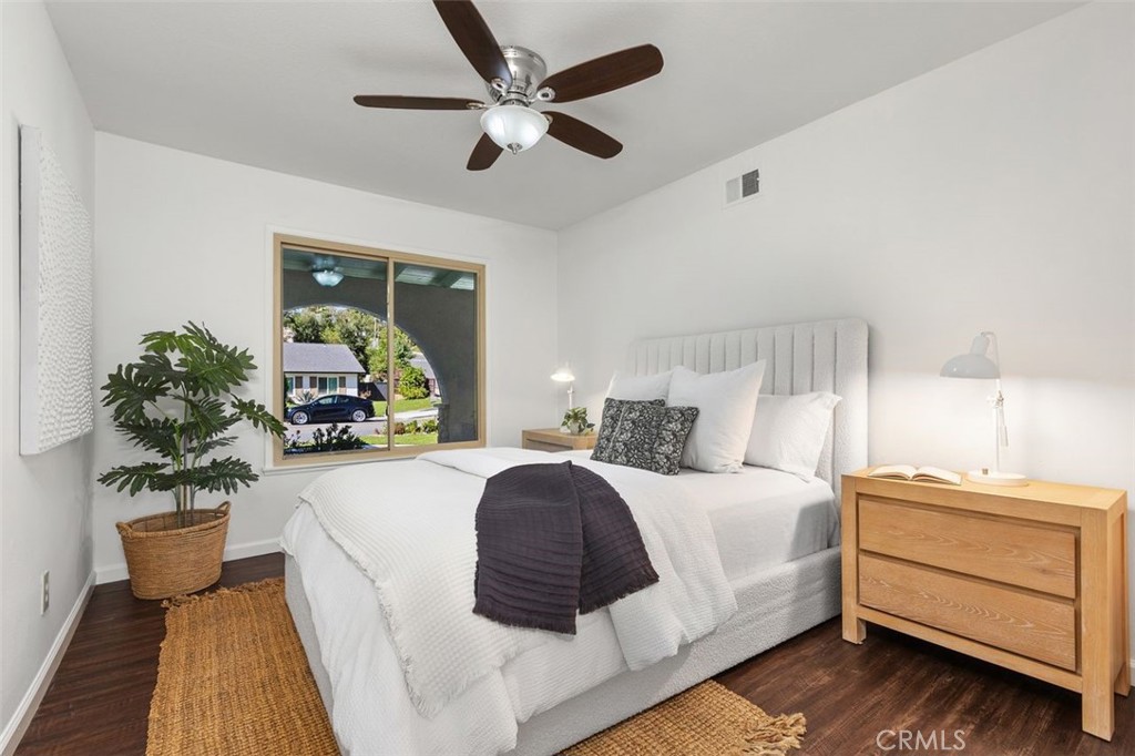 Guest bedroom #1 has views out to the front yard. - 24832 El Cortijo, Mission Viejo CA 92691 - photo 14